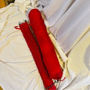 Quest Red sun shelter covered with rods